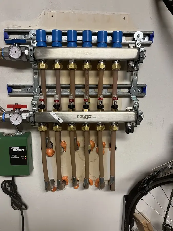 Plumber performing Gas Line Installation at a residential property in Columbia Heights