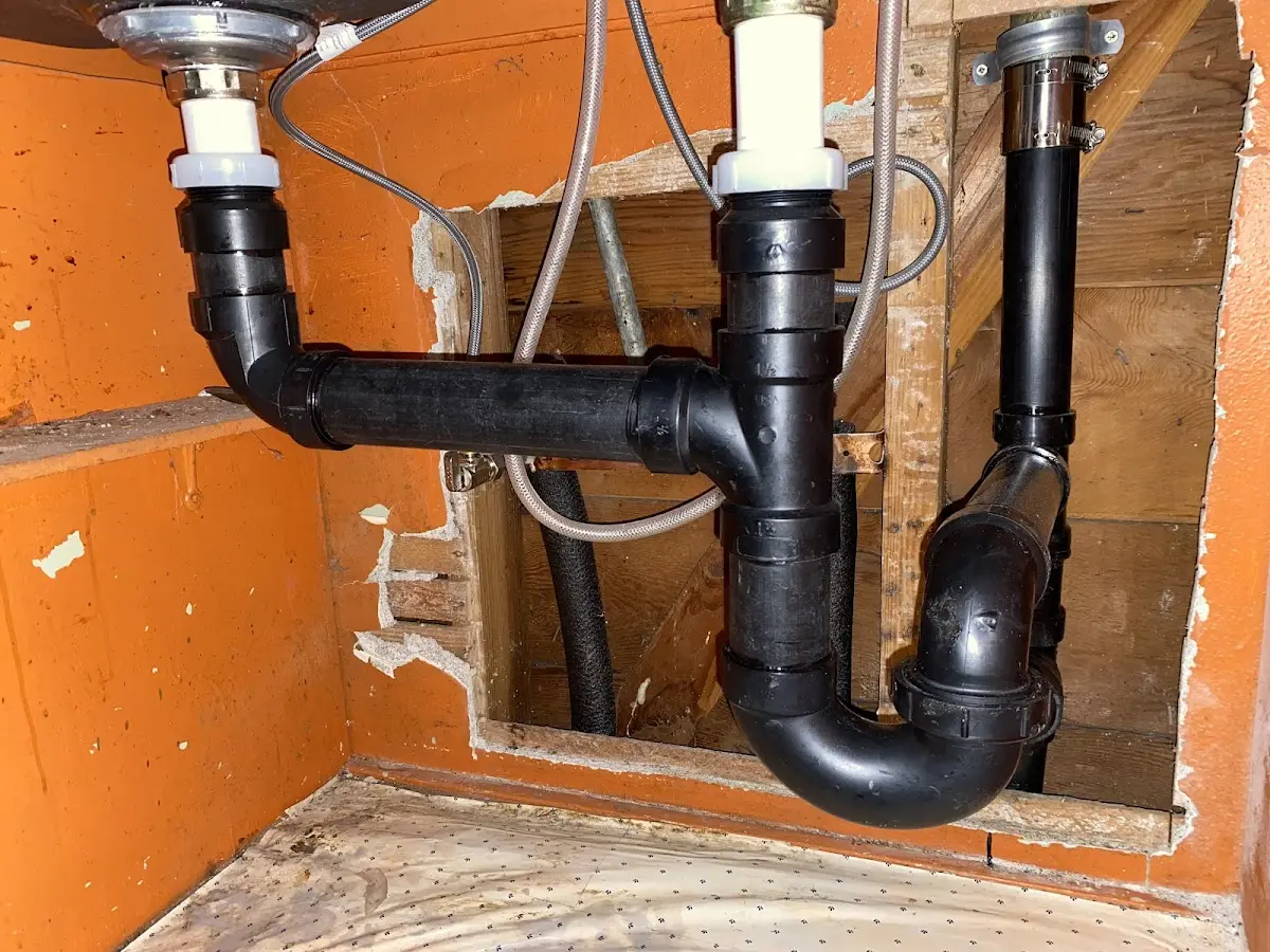 Professional Garbage Disposal Repair equipment and tools on the job in Columbia Heights